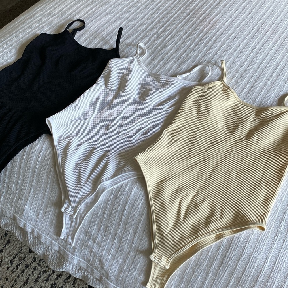 Three-piece set OQQ bodysuits size medium white black cream